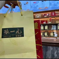 重阳给长辈送张一元：先问一句“您平时怎么沏”，再把总店12款价签的克单价摊开
