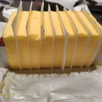 GDT拍卖黄油七连跌，你货架上的安佳却在反向涨价：降价信号卡在三段管道里，别急着囤