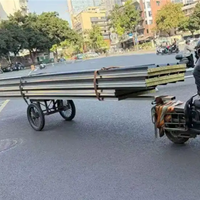 成都二仙桥大爷又被交警拦下：骑电动车违规载货 被安全教育