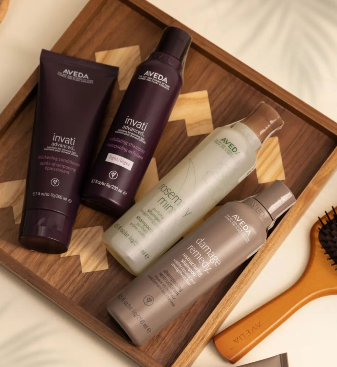 同一瓶 Aveda 1L：专柜 590，中免领券能到 252，双11 前先把渠道账算清