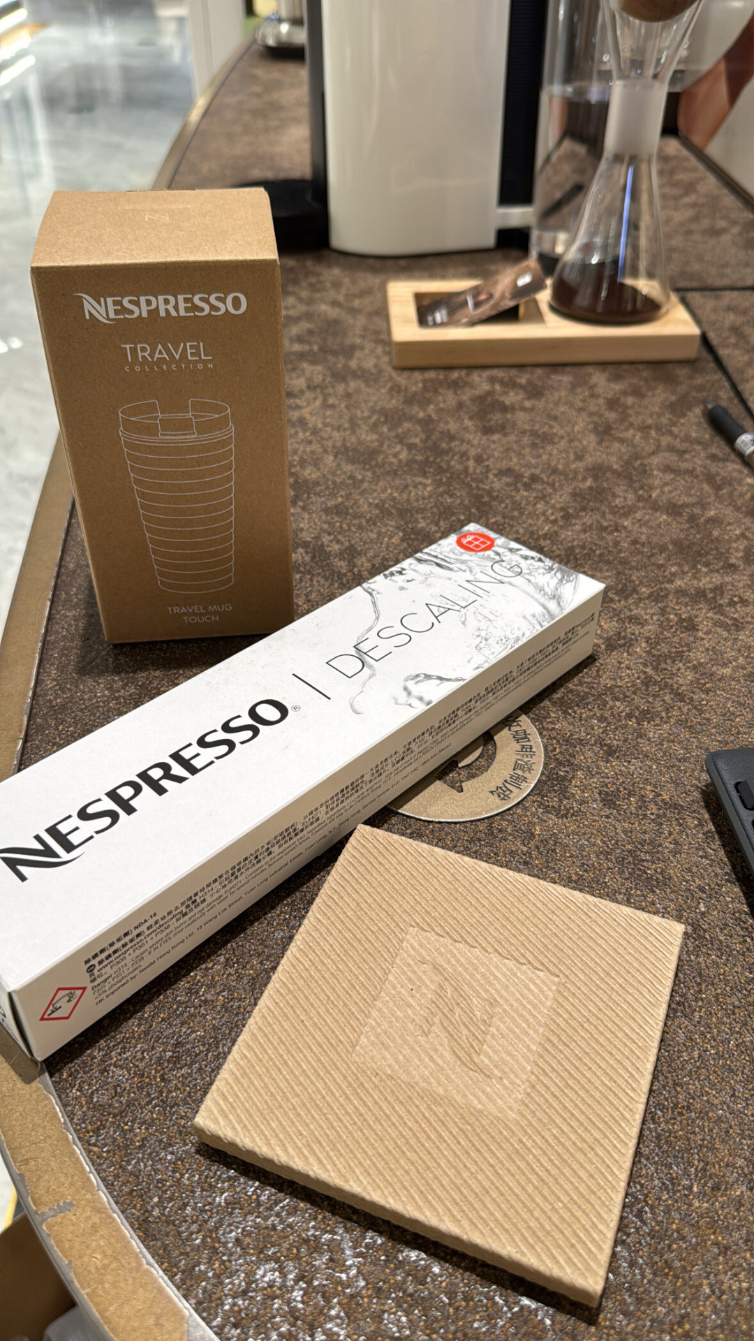 线上寄3公斤只记1点,线下1公斤记2点:Nespresso空胶囊回收的500克门槛、12次上限和随单礼