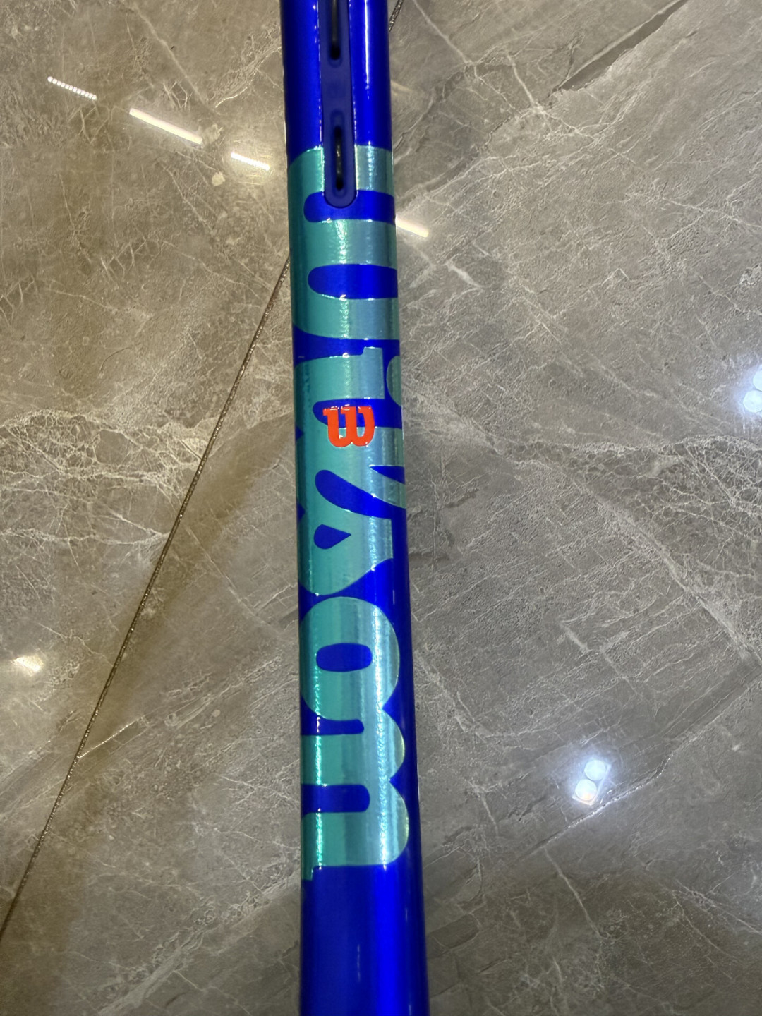 郑钦文中网夺冠那支拍,和你买的“同款”可能不是同一把