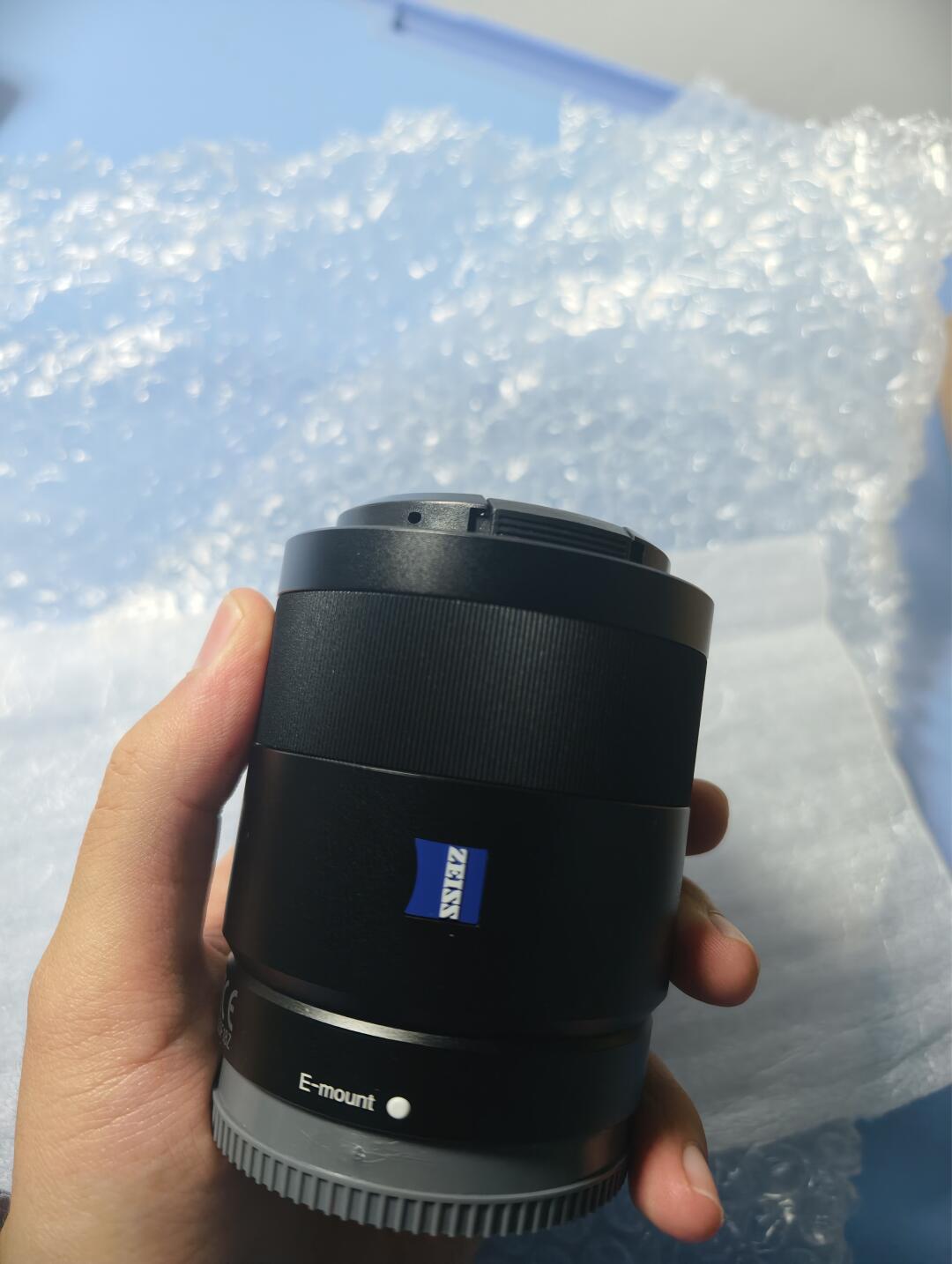 999元的新镜头敲门，跌到一千多的蔡司55/1.8还冲不冲？
