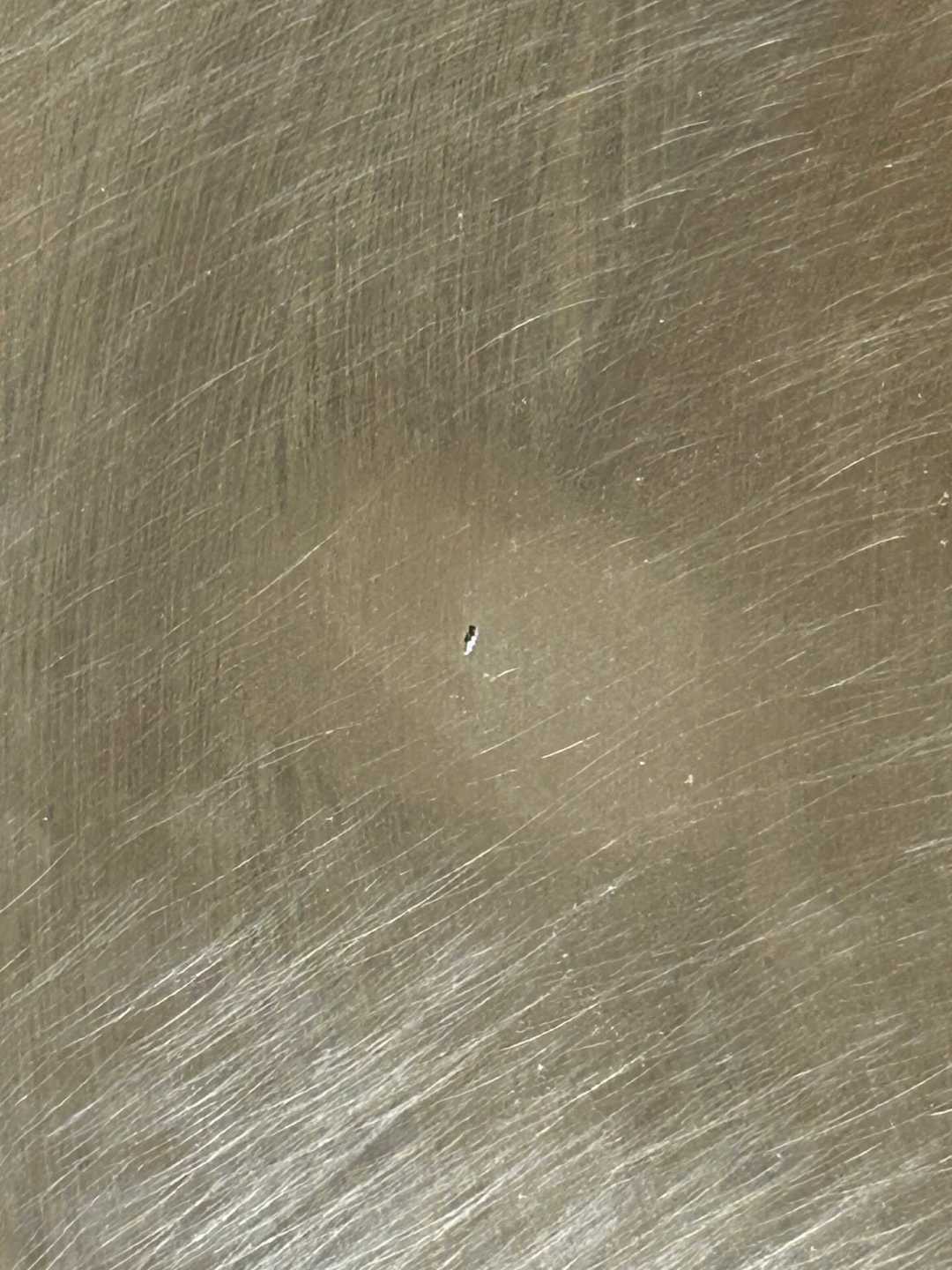臻三环锅底有小坑,是不是砂眼:倒点水就能试出来