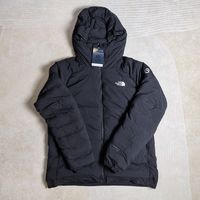 一件故意"漏风"的羽绒服：北面50/50结构解决什么问题